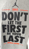 Nike Jordan Men's Don't Let The First Be Your Last 1991 World Champ Gray Shirt M